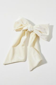 Large hair bow in soft velvet for a luxe touch. This hair clip instantly gives your look a polished femme touch. Features Large velvet hair bow clip Hair clip with a bow detail Velvet ribbon bow Secure clip backing Content + Care Textile, mixed metal Spot clean Imported | Large Velvet Hair Bow Clip in Ivory, Women's at Urban Outfitters Velvet Ribbon Bow, Velvet Hair Bow, Large Hair Bow, Large Hair Bows, Hair Bow Clip, Velvet Hair, Bow Clip, Clip Hair, Bow Hair Clips