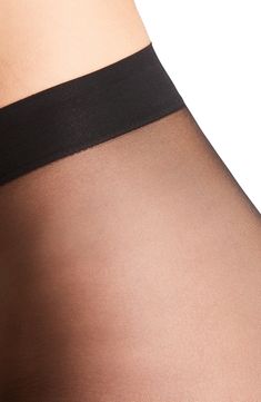 Silky-smooth tights feature a ribbed waistband and nonladdering toes for allover even, sheer tone. Lined gusset 88% polyamide, 12% elastane Machine wash, dry flat Imported Black Nylon Tights With High-cut Leg, Black Nylon High-cut Leg Tights, Black Nylon High-cut Legwear, Elegant Compressive Thigh High Legwear, Elegant Compressive Thigh-high Legwear, Elegant Thigh-high Compressive Legwear, Thigh High Smoothing Tight Stockings, Compressive Nylon Thigh-high Legwear, Thigh-high Nylon Tights