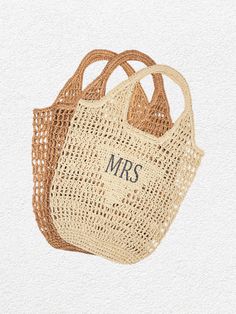 two bags with the word mrs printed on them