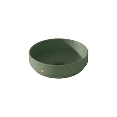 the bowl is green and has a small hole for it to be used as a sink