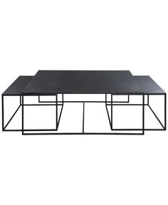 a black table with two tables on top and one is empty, but the other has no legs