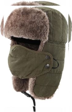 an image of a winter hat with fur on the top and ear flaps attached to it