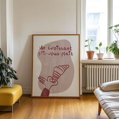 a living room filled with furniture and a painting on the wall next to a window