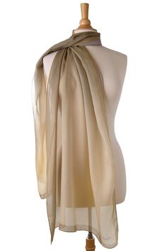 This gossamer light silk chiffon wrap will add classic femininity to your look. Soft and flowing, you can wear this with everything! 100% Made in Como, Italy. Generous size: Approx. 27" x 78". You can wear this wrap as an elegant evening shawl and also as a daytime scarf. A timeless addition to your wardrobe. 100% silk chiffon: A luxurious, gossamer-light fabric known for its sheer, delicate texture and graceful drape. Its natural breathability and gentle movement enhance the beauty of our desig Gentle Movement, Evening Shawls, Light Silk, Chiffon Wrap, Como Italy, Natural Silk, Rolled Hem, Naturally Dyed, Silk Chiffon