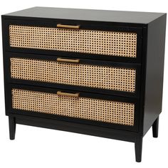 a black dresser with wicker drawers and gold handles