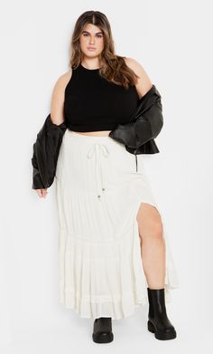 Choose effortless summer style with the figure-flattering Aurora Skirt. Featuring a comfortable elastic drawstring waist and lightweight fabric, it keeps you cool and comfortable on hot summer days. Key Features Include: - Elasticated drawstring waistline - Pull up style - Flared silhouette - Tiered design - 100% cotton lining - Maxi length Choose a denim jacket and graphic tee to layer over your summer skirt for a relaxed and trendy vibe. | Plus Size Skirt Aurora 26 in Ivory, Size 16/S | City C Ivory Skirt, Plus Size Skirt, Denim Maxi Skirt, Slip Skirt, Plus Size Skirts, Summer Chic, Women Maxi, Summer Skirts, Chic Woman