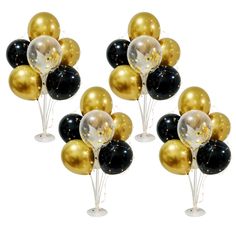 black and gold balloons are arranged in the shape of wine glasses