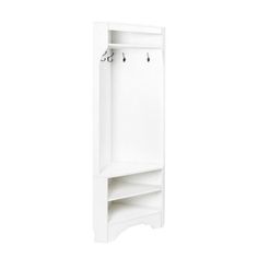 a white wooden shelf with hooks on it