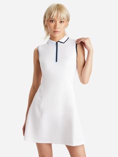 DESCRIPTION:Sleeveless polo-style dress with a quarter-zip closure and contrast tipping details.FEATURES:DressSpread CollarQuarter-Zip ClosureSleevelessContrast TippingSide Zip PocketsRemovable SlipMini SilhouetteLength: 34.5 in.Performance Fabrication73% Nylon, 27% ElastaneActive Fit Wilson Sporting Goods, Tennis Girl, Golf Women, Golf Dress, Zip Front Dress, Uniform Accessories, Tennis Style, Dress Collar, Womens Tennis