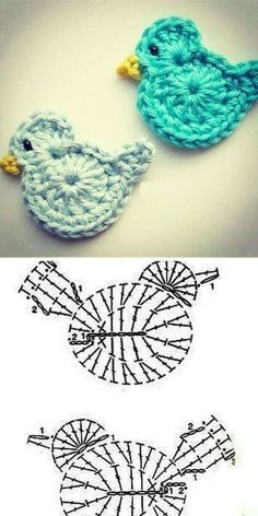 two crocheted birds sitting next to each other