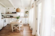 the kitchen is clean and ready to be used as a dining room or living area