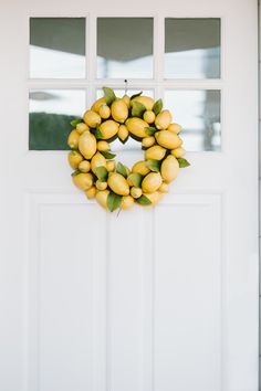 a lemon wreath hangs on the front door