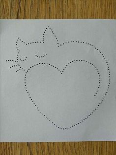 a piece of paper with a heart drawn on it