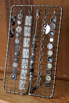 there is a metal rack with many buttons on it