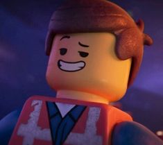 the lego movie character is wearing an orange vest