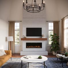 a living room with a couch, coffee table and fireplace