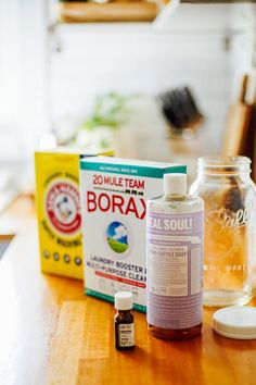 the contents of a bottle of borax sit on a table next to some other items