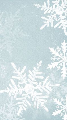 snow flakes on a blue background with space for text