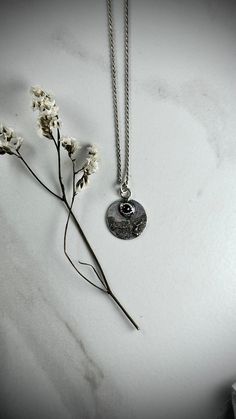 Introducing our Arcane Pendants, each a handcrafted testament to the beauty of nature and the cosmos. These unique pieces feature round silver discs with intricately textured surfaces, evoking a rustic, organic feel that is both timeless and enchanting. These pendants are more than just jewelry; they are talismans of personal expression, crafted for those who appreciate the magic in simplicity and the power of intention. they serve as a beautiful reminder of the natural world’s wonders, perfect Amulet Style Pendant Jewelry For Meditation, Adjustable Metal Amulet Necklace, Intricate Design Amulet Necklace For Meditation, Meditation Amulet Pendant Jewelry, Amethyst Amulet Necklace For Meditation, Mystical Jewelry, Psychic Attack, Metalwork Jewelry, Star Sapphire