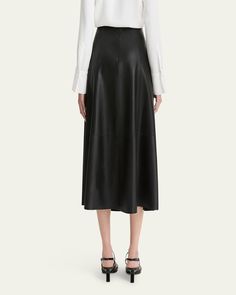 Vince skirt engineered in panels of supple leather    Banded waist    Side seam pockets    Hem falls below the knee    Circlecut silhouette    Professional leather clean only    Imported Leather Midi Skirt, Black Midi Skirt, Leather Cleaning, Leather Band, Sale Design, The Knee, Mid Rise, Midi Skirt, Tops Designs