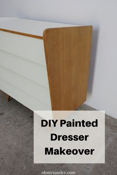 a white dresser sitting next to a wall with the words diy painted dresser makeover