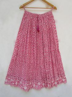 "ITEM DESCRIPTION traditional beach look printed cotton long maxi skirts - summer wear elastic waist with tassel skirts Material: 100% cotton cambric soft crinkled fabric Length: - 38 inch long Waist :-28.00 inch full (14 inch half) 28 inch relaxed can stretch up to 50 inch Size: free size (fit to all) PRODUCT NAME: - Long Women Maxi skirts Ladies Vintage Long skirts Company Return Policy: Please write for more information to my email directly CHOOSE \"ASK SELLER QUESTION \" payment policy:- we Long Maxi Skirts Summer, Tassel Skirts, Moomoo Dress, Crinkled Fabric, Maxi Skirts Summer, Tassel Skirt, Skirts Summer, Long Summer Dresses Maxi, Girls Maxi Dresses