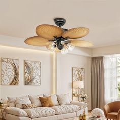 a living room filled with furniture and a ceiling fan mounted to the side of a wall