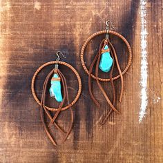 -These bold hoop earrings are part boho and part badass.  Made from soft rust deerskin leather and turquoise howlite stones.  -Total length from the top of the hook to the tip of the leather tassel is 6” - 6.5”.-Earwires are antique-brass.  Goldfill earwires are available by request. -Deerskin leather is sustainably sourced in the USA.-Ok to get wet.-Available in 7 colors.-Designed and handmade in South Pasadena, CA.Check out more of our lovely earrings here:https://www.etsy.com/shop/ASTALIJewel Bohemian Turquoise Hoop Earrings Nickel Free, Unique Handmade Turquoise Hoop Earrings, Bohemian Hoop Wrap Earrings, Rustic Handmade Hoop Earrings, Bohemian Brown Pierced Hoop Earrings, Turquoise Pierced Hoop Earrings, Artisan Turquoise Hoop Earrings, Bohemian Brown Wire Wrapped Hoop Earrings, Handmade Southwestern Turquoise Hoop Earrings