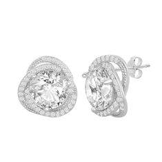 pair of white gold earrings with diamond halos and round brilliant cut diamonds in the center