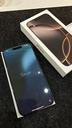 the new oppo phone is in its box next to it's original packaging