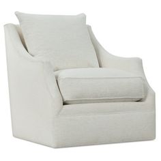 the arm chair is upholstered with white linen