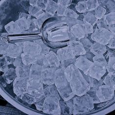 an ice bucket filled with lots of ice