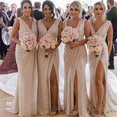 the bridesmaids are all wearing different dresses