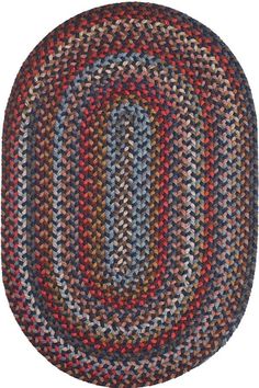 an oval rug with multicolored braiding on the center and bottom in blue, red