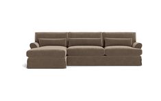 a brown couch with pillows on top of it