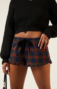 The Velvet Tie Front Boxer Shorts from LA Hearts bring a touch of sophistication to casual wear. Featuring a velvet tie waist, plaid print, and a ruffled hem, these shorts offer a relaxed fit that combines comfort with a stylish flair.10.5" rise2.375" inseamButton front placketPlaid print shortsVelvet tie waistRuffled hemRelaxed fit100% cotton; Contrast: 100% polyesterHand washModel is wearing a size smallModel measurements: 5’11” height, 35” bust, 26” waist, 38” hipsMeasurements taken from a si Cute Boxers For Woman, Boxers For Women Shorts, Boxers Plaid, Boxers For Women, Christmas Shorts, Xmas Clothes, Heart Shorts, Flannel Shorts, Xmas Outfits