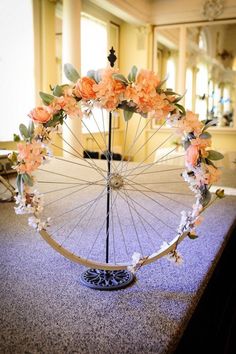 an umbrella decorated with flowers on the ground