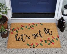 a door mat that says let's get it