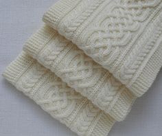 Hand knitted Long Scarf. Aran Wool Scarf in Off-White colour. Celtic motives. Approx. Size: 29 cm x 211 cm (11.4″ x 83.1″) Approx. Weight: 392 g (13.8 oz) This scarf is made of soft and very warm 100% wool yarn. This scarf knitted in a pet free and smoke free studio. Hand wash, max 40oC (104oF). Don't bleach. Don't use fabric softener. Dry Flat. This item is ready to be shipped. I will send you a tracking number when the item is shipped, so you can track your package. If you didn't receive your Cable Knitting Patterns, Scarf Knitted, Cable Knit Scarf, Scarf Wool, Christmas Scarf, Cable Knitting, Patterned Scarves, Warm Scarf, White Colour