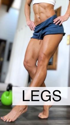 a woman standing on top of a hard wood floor next to a green ball with the words legs written below it