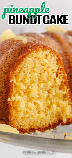 a close up of a bundt cake on a plate with the words pineapple bundt cake