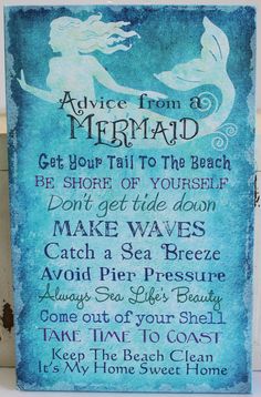 a blue plaque with the words advice from a mermaid and an image of a mermaid on it