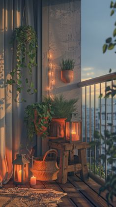 a balcony with candles and potted plants on it