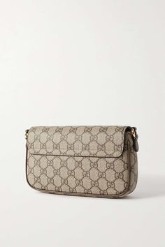 GUCCI Ophidia leather-trimmed printed coated-canvas shoulder bag | NET-A-PORTER Luxury Monogram Canvas Baguette Bag For Everyday Use, Monogram Canvas Clutch Shoulder Bag With Removable Pouch, Luxury Beige Baguette Bag, Classic Monogram Canvas Pouch Shoulder Bag, Gucci Rectangular Everyday Bag, Gucci Rectangular Bag For Everyday Use, Everyday Luxury Coated Canvas Shoulder Bag With Dust Bag, Elegant Monogram Canvas Baguette Shoulder Bag, Elegant Monogram Canvas Baguette Bag For Everyday Use