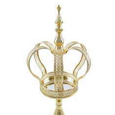 This product features intricately ornate patterns and a grand shape. Place lights or floral inside, pair with complementary decor pieces or use solo as a standout piece. A mirrored base withstand is included, and easily detachable for versatile use! Rosdorf Park Size: 21.25" H x 7.5" W x 7.5" D, Finish: Gold | Rosdorf Park Shanon Royal Crown Decor Centerpiece w / Stand 21.25 H x 7.5 W x 7.5 D in yellowMetal / Crystal in Gold | 21.25" H x 7.5" W x 7.5" D | Wayfair Emperor Crown, Mirror Centerpiece, Crown Centerpiece, Crown Silhouette, Crown Decor, Beaded Crown, Metal Crown, Silver Crown, Crown Royal