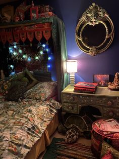 a bed room with a neatly made bed next to a night stand and a mirror