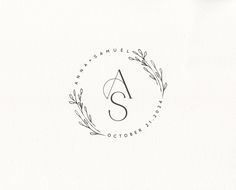 the letter s is inscribed in a circle with leaves