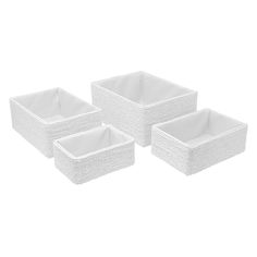 three white wicker baskets with handles