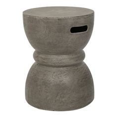 a cement stool with a hole in the middle and an opening at the top for storage