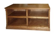 a wooden entertainment center with shelves on each side